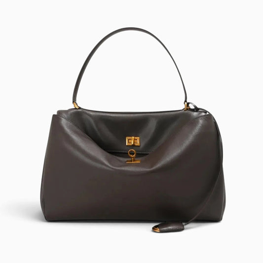 Sac à main cabas pour femme en cuir marron de la marque Élégance Cuir, avec poignées et design spacieux visible dans l'image.