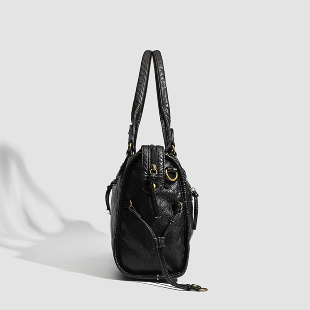 Grand sac à main de cours vintage à bandoulière Élégance Cuir, en cuir marron avec détails en métal et poignée ajustable.