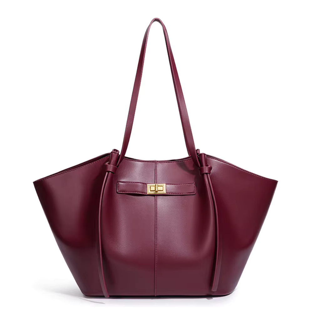 Grand sac à main cabas Élégance Cuir Lisa, en cuir beige avec poignées robustes et design spacieux pour accessoires et livres.