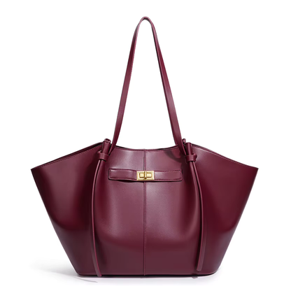 Grand sac à main cabas Élégance Cuir Lisa, en cuir beige avec poignées robustes et design spacieux pour accessoires et livres.