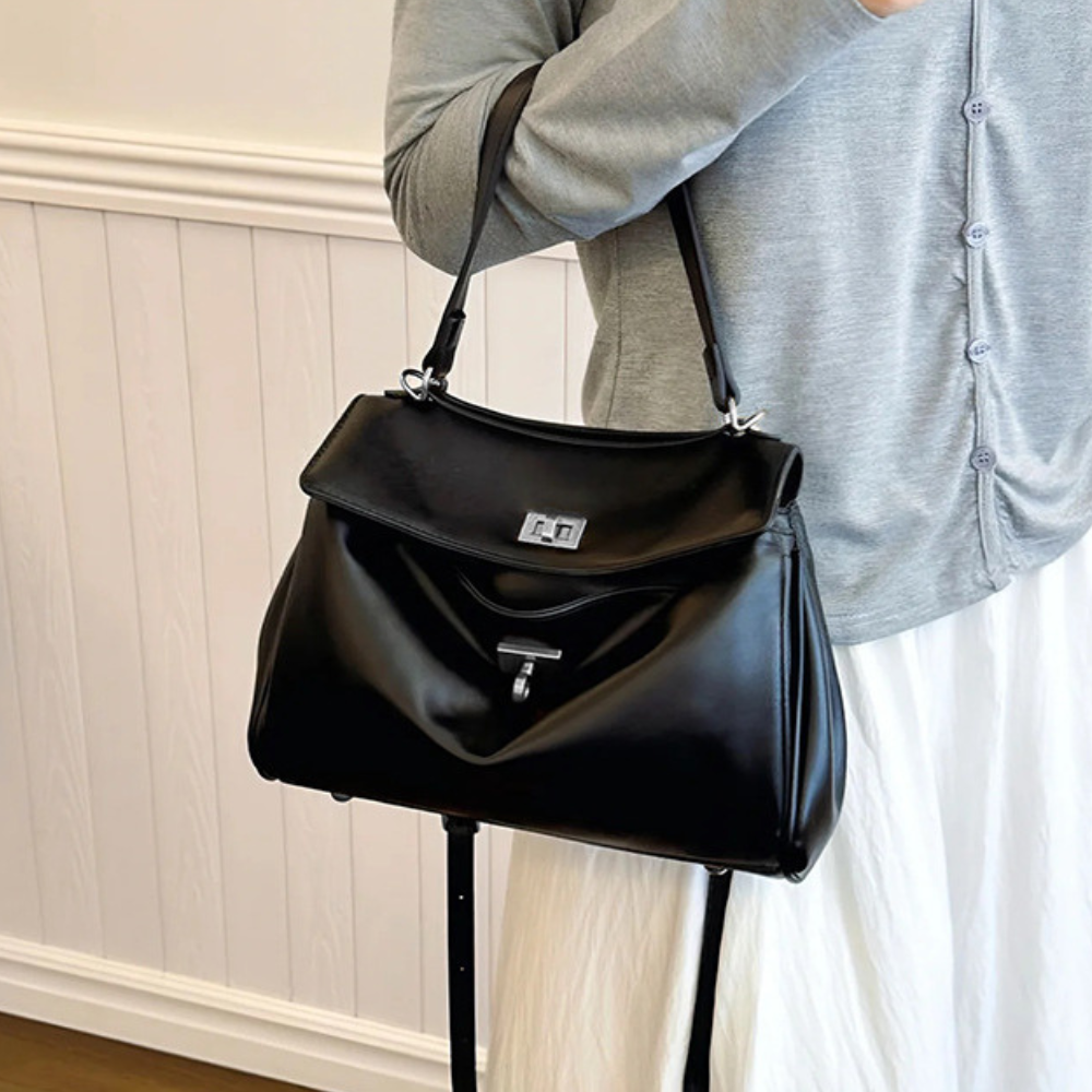 Sac à main cabas pour femme en cuir de la marque Élégance Cuir, vue de face avec poignées et finition élégante.