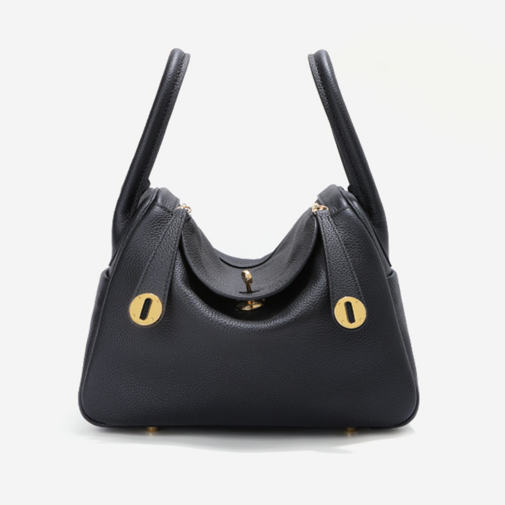 Sac à main bandoulière en cuir Élégance Cuir, sac à main élégant avec poche extérieure, couleur noire et finition raffinée.