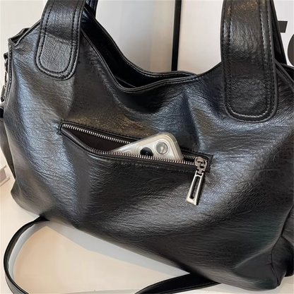 Grand sac à main souple Élégance Cuir Lucie avec poignées en cuir et compartiments spacieux, élégant et pratique.