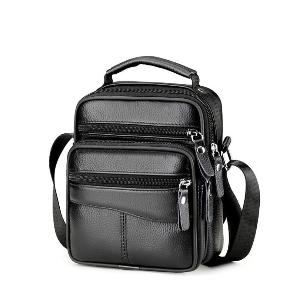 Sacoche homme en cuir avec bandoulière et accroche, élégance et pratique pour un style masculin sophistiqué.