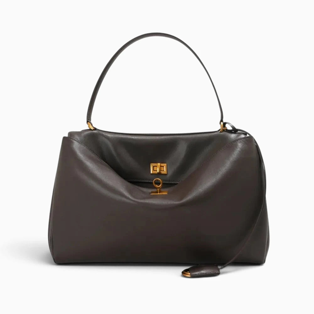 Sac à main cabas pour femme en cuir marron de la marque Élégance Cuir, avec poignées et design spacieux visible dans l'image.