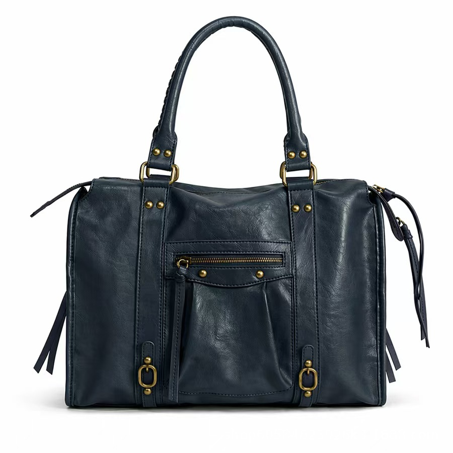 Grand sac de cours pour étudiant Élégance Cuir en bleu, avec poignées et compartiments spacieux pour accessoires et livres.