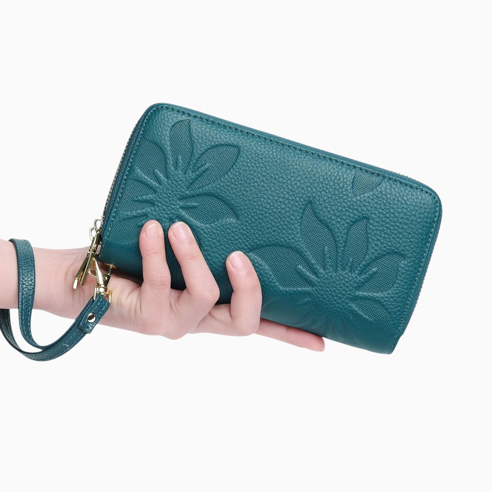 portefeuille femme cuir fleur bleu main