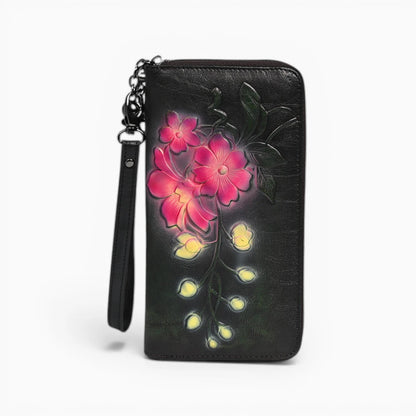 Portefeuille femme en cuir illustré Nuit Florale, présentant un design élégant et coloré de fleurs.