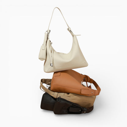 Sac bandoulière en cuir hobo pour femme modèle Sophie de la marque Élégance Cuir, affichant 4 coloris.
