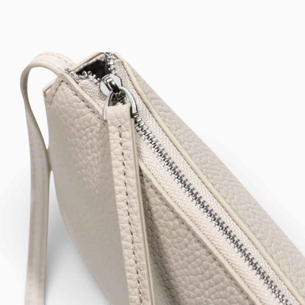 Sac bandoulière en cuir pour femme, modèle Victoria, design compact et vertical avec finition élégante en cuir vue fermeture zippée