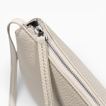 Sac bandoulière en cuir pour femme, modèle Victoria, design compact et vertical avec finition élégante en cuir vue fermeture zippée