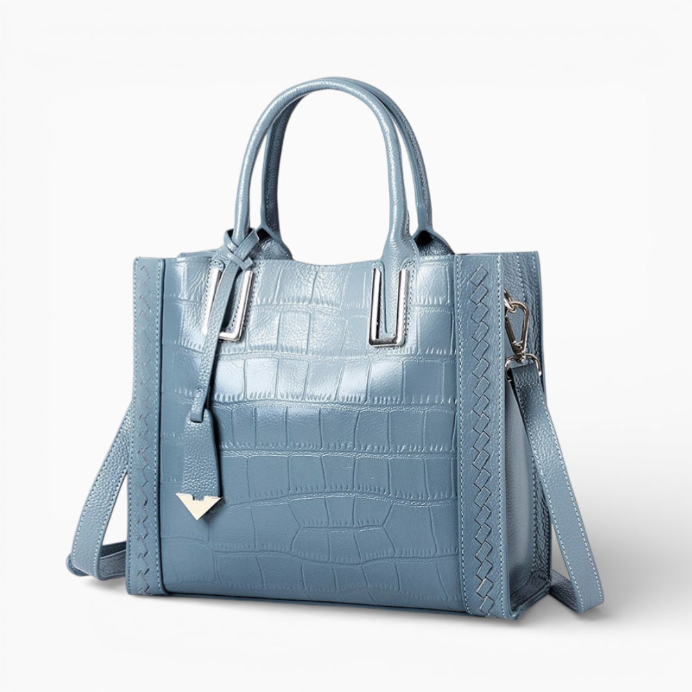 Grand sac cabas en cuir bleu pour femme, modèle Nantes de la marque Élégance Cuir, vu de côté.