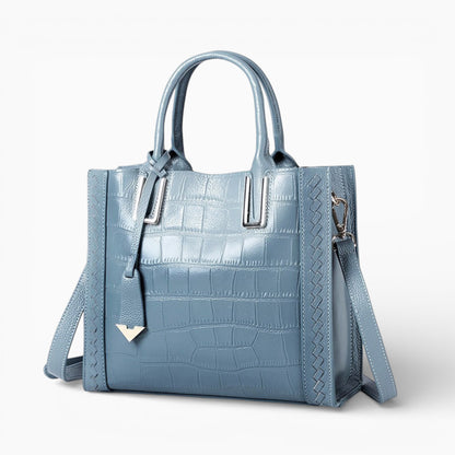 Grand sac cabas en cuir bleu pour femme, modèle Nantes de la marque Élégance Cuir, vu de côté.