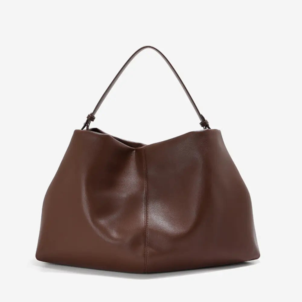 Sac cabas souple en cuir véritable marron de la marque Élégance Cuir, avec poignées résistantes et design élégant.