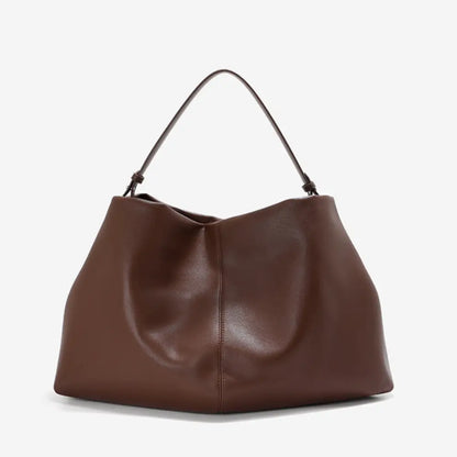 Sac cabas souple en cuir véritable marron de la marque Élégance Cuir, avec poignées résistantes et design élégant.