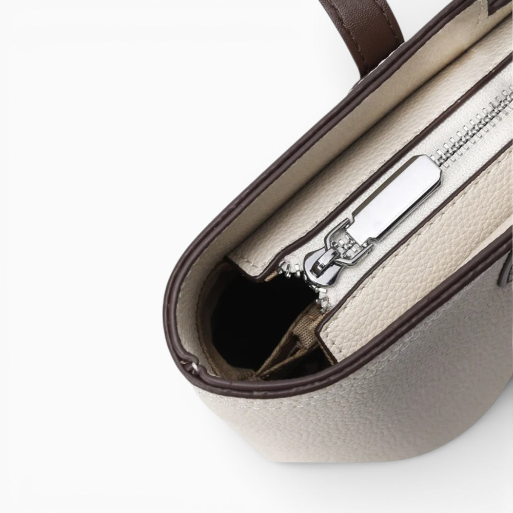 Sac cabas horizontal en cuir blanc pour femme modèle Monaco de la marque Élégance Cuir, avec tirette visible.