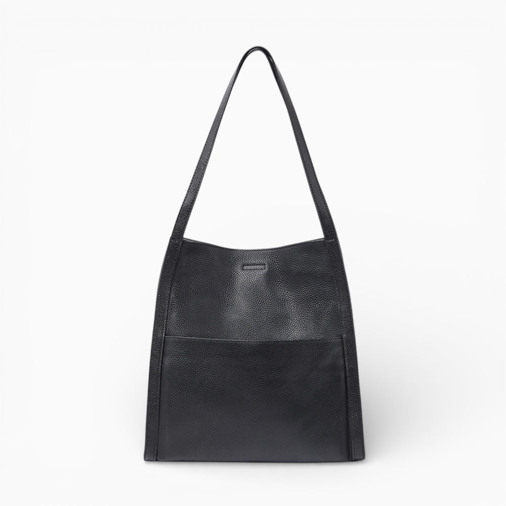Sac cabas en cuir noir pour femme, modèle Lyon, avec une structure souple, vue de face.