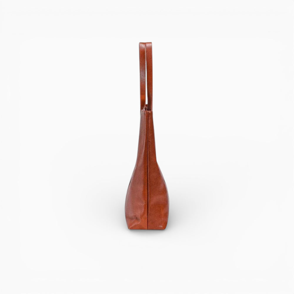 Sac cabas en cuir pour femme, modèle Cannes, style minimaliste, affichant une texture lisse et des poignées élégantes.