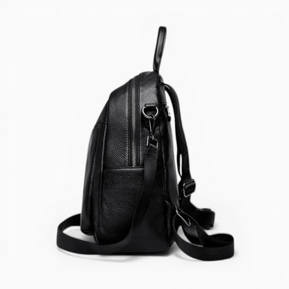 Sac à dos compact en cuir pour femme, modèle Nora de Élégance Cuir, vue de côté.