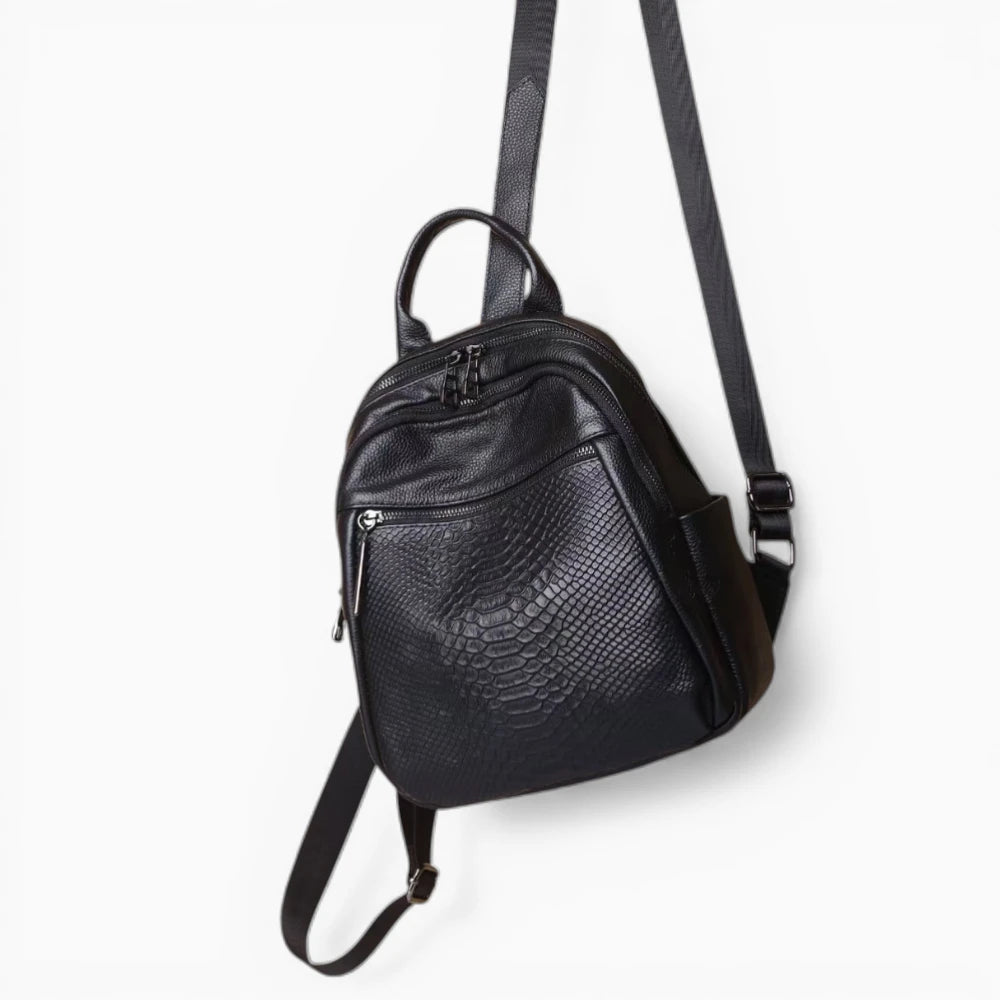 Sac à dos en cuir noir pour femme avec poche zippée avant, modèle Chantilly de la marque Élégance Cuir
