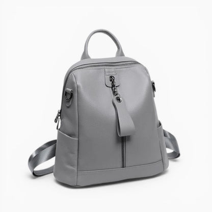 Sac à dos en cuir pour femme Élégance Cuir, modèle Sélène, avec double zip et fermeture verticale, gris vue de coté