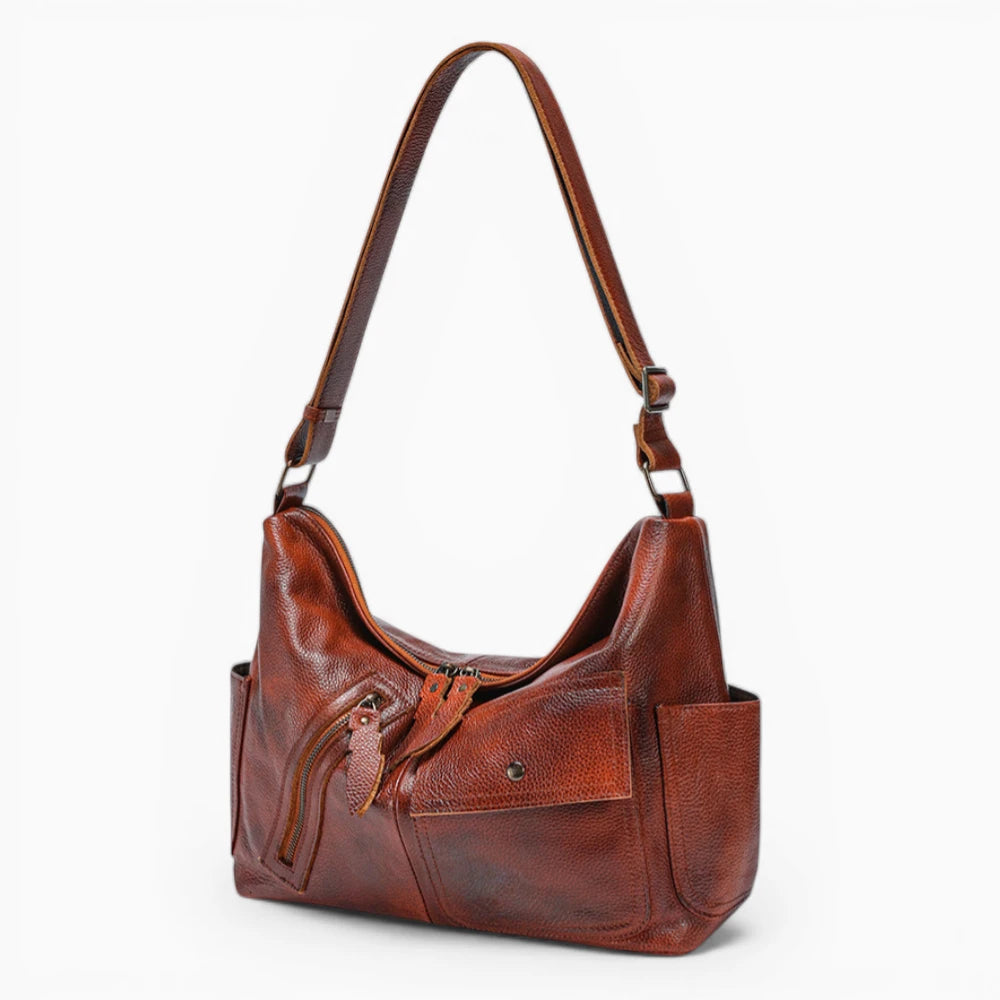 Sac à main en cuir pour femme de la marque Élégance Cuir, modèle Belle Époque avec poches extérieures élégantes vue de coté
