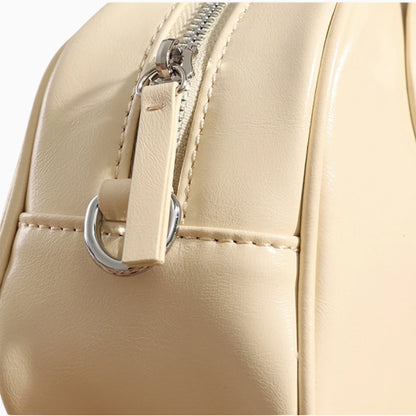 Sac à main en cuir structuré pour femme, modèle L’Impériale d'Élégance Cuir, blanc cassé fermeture zippée