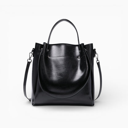 Sac à main grand format structuré en cuir noir La Magistrale d'Élégance Cuir, illustrant un design et un savoir-faire élégants.