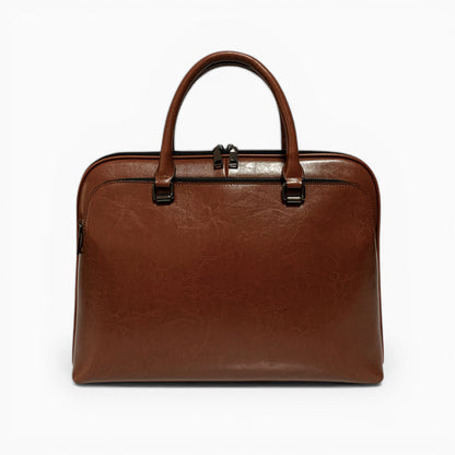 Sac ordinateur homme en cuir marron avec double poignée et bandoulière amovible, modèle Le Diplomate d'Élégance Cuir, vue de face