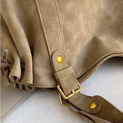 Grand sac à main de cours bowling Élégance Cuir Noemi 2, en cuir avec poignées, design élégant et spacieux.