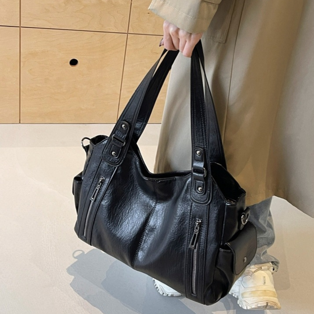 Grand sac à main souple Élégance Cuir Lucie avec poignées en cuir et compartiments spacieux, vue de face.