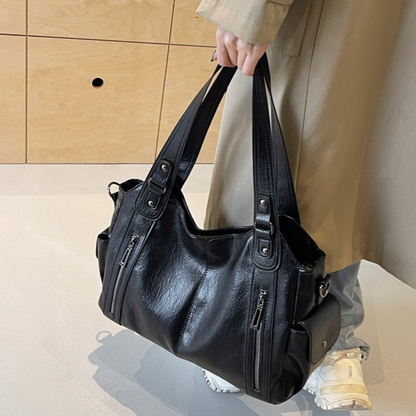 Grand sac à main souple Élégance Cuir Lucie avec poignées en cuir et compartiments spacieux, vue de face.