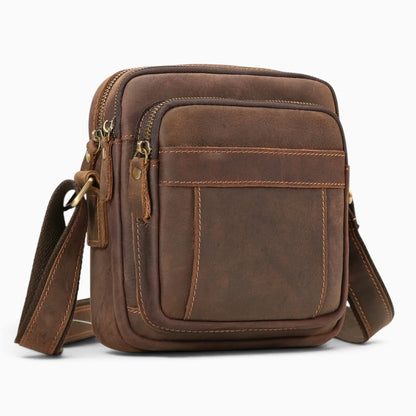 Sacoche homme en cuir marron Élégance Cuir avec poches zippées, sacoche bandoulière élégante et pratique pour homme.