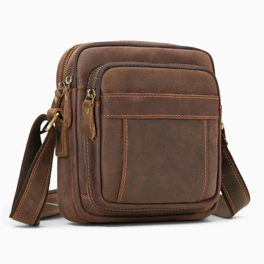 Sacoche homme en cuir marron Élégance Cuir avec poches zippées, sacoche bandoulière élégante et pratique pour homme.