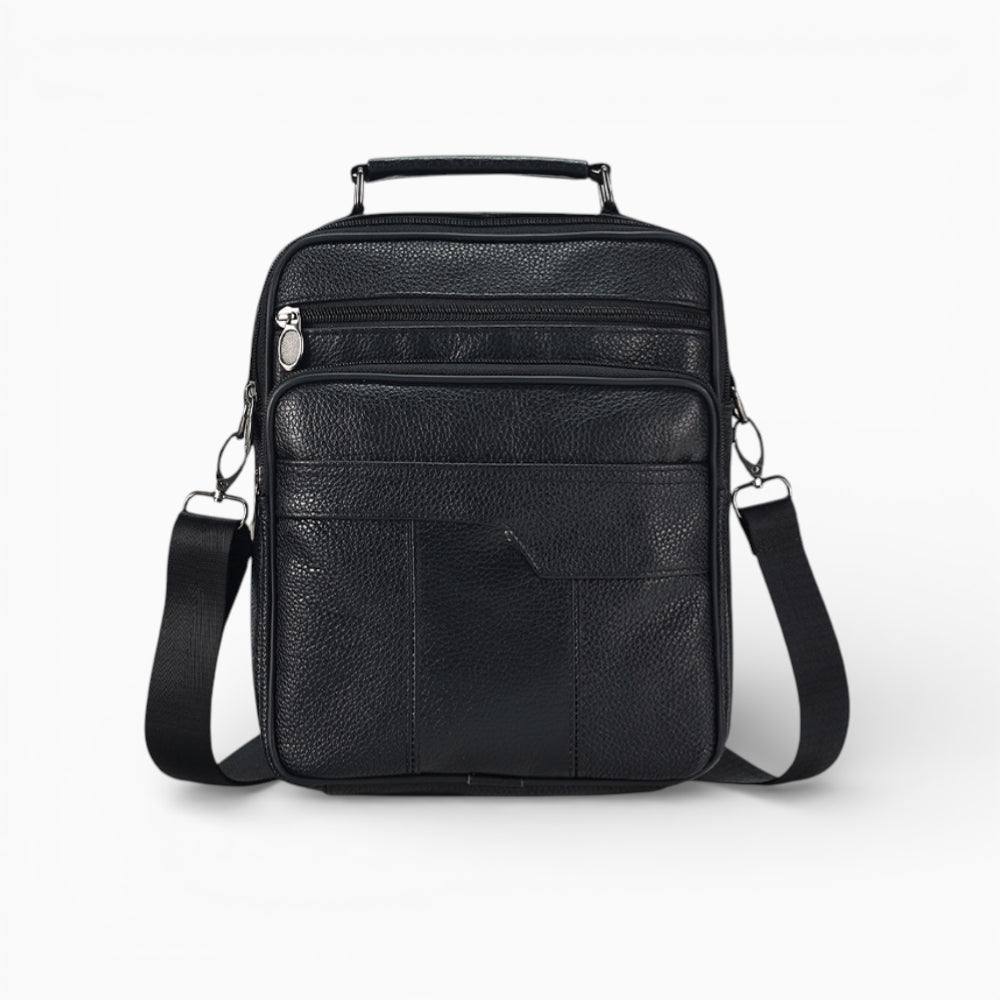 Sacoche bandoulière homme en cuir noir, format vertical avec poche zippée, modèle Alliance de la marque Élégance Cuir.
