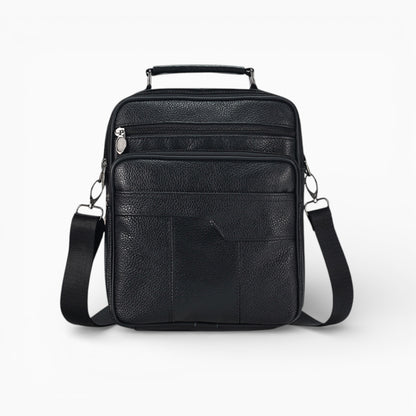 Sacoche bandoulière homme en cuir noir, format vertical avec poche zippée, modèle Alliance de la marque Élégance Cuir.