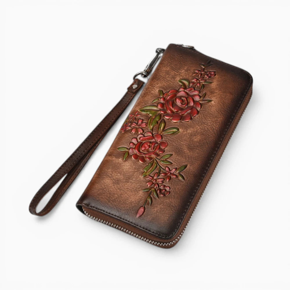 Portefeuille femme en cuir marron foncé avec motif floral et fermeture zip