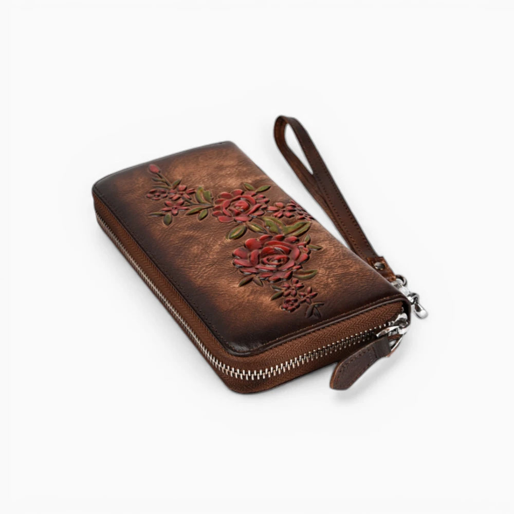 Portefeuille femme en cuir marron foncé avec motif floral et fermeture zip