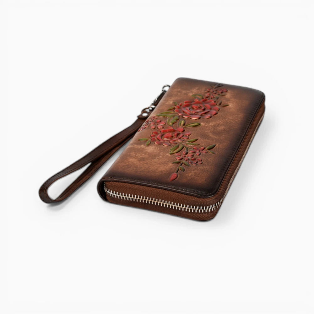Portefeuille femme en cuir marron foncé avec motif floral et fermeture zip