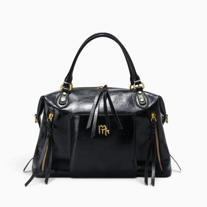 Sac à main en cuir noir pour femme, modèle CAMPUS d'Élégance Cuir, avec poignées et poche extérieure visible.