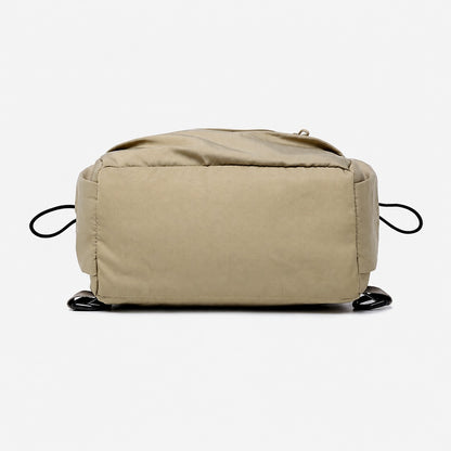 Vue du dessous de la sacoche Escalade beige en tissu Oxford