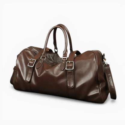 Sac de voyage en cuir marron vue en angle avec bandoulière