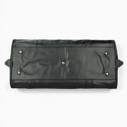 Dessous du sac de voyage en cuir noir avec pieds de protection