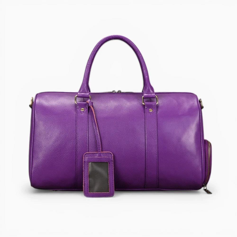 Sac de voyage en cuir violet vue de face avec poignées
